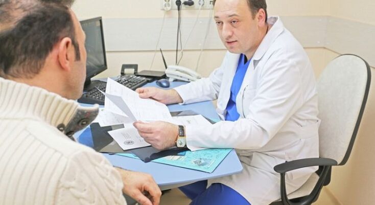 A man in consultation with a urologist